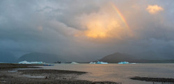Tatshenshini River Rafting Alaska - Rainbow over Alsek Lake. Photo: Pete Wallstrom