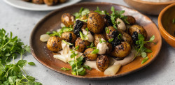 Smoked Potatoes with Ramp Aioli and Black Garlic - Wilderness Gourmet Rafting Trips - Photo: Wilder Projects